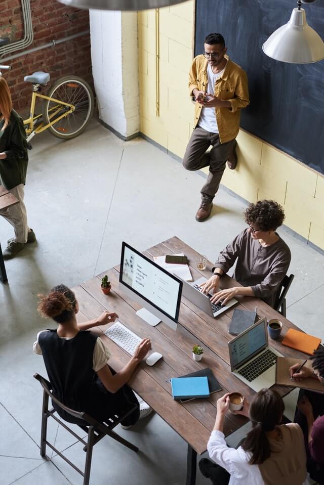 People working in an office seen from the top